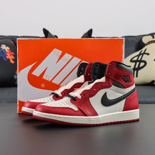 Air Jordan 1 Retro High OG Lost and Found. Red and white sneakers with black accents on a dark surface, with an orange Nike box in the background. 