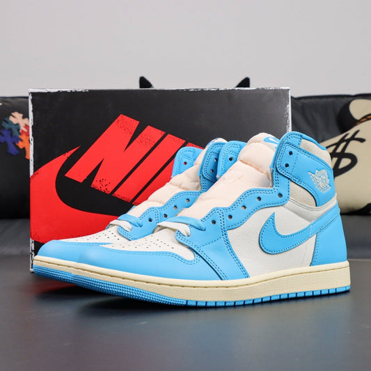 Air Jordan 1 Retro High OG UNC Reimagined. Blue and white sneakers with a prominent Nike logo in the background.